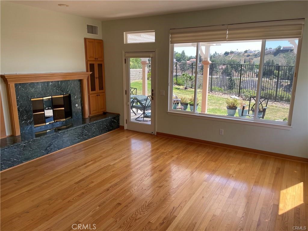 11736 Mariposa Bay Lane Porter Ranch, CA 91326 - Photo 4 of 22 Family room with access to back yard