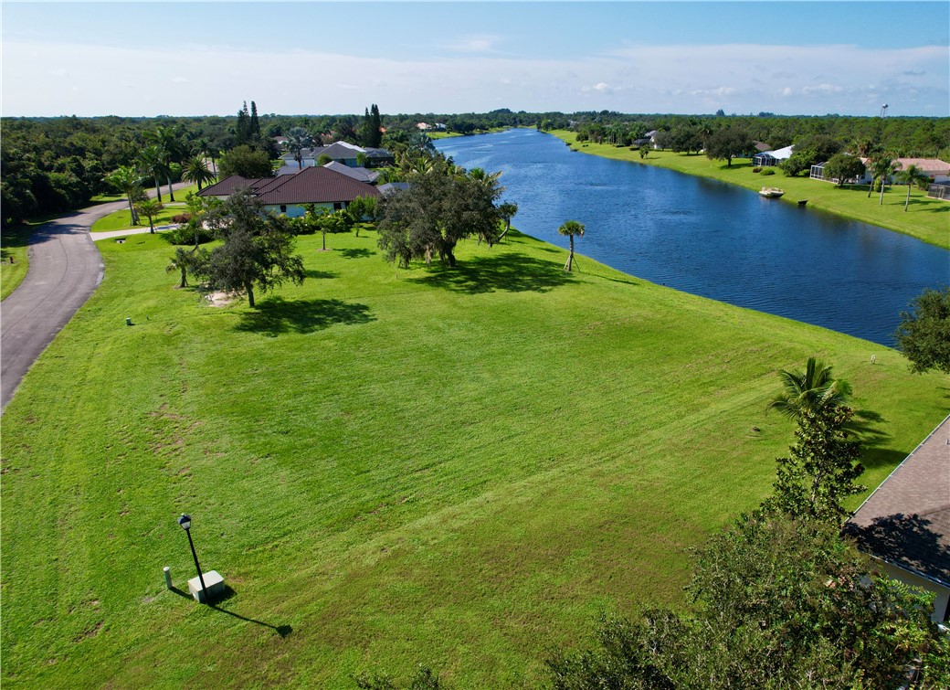 1552 Eagles Circle Sebastian, FL 32958 - Photo 15 of 16 an aerial view of a houses with a lake view