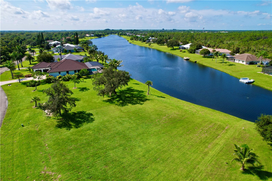 1552 Eagles Circle Sebastian, FL 32958 - Photo 4 of 16 an aerial view of a houses with a yard