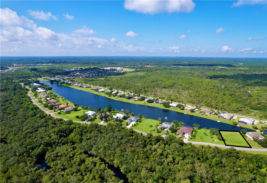 1552 Eagles Circle Sebastian, FL 32958 - Photo 10 of 16 a view of a garden with a flower garden