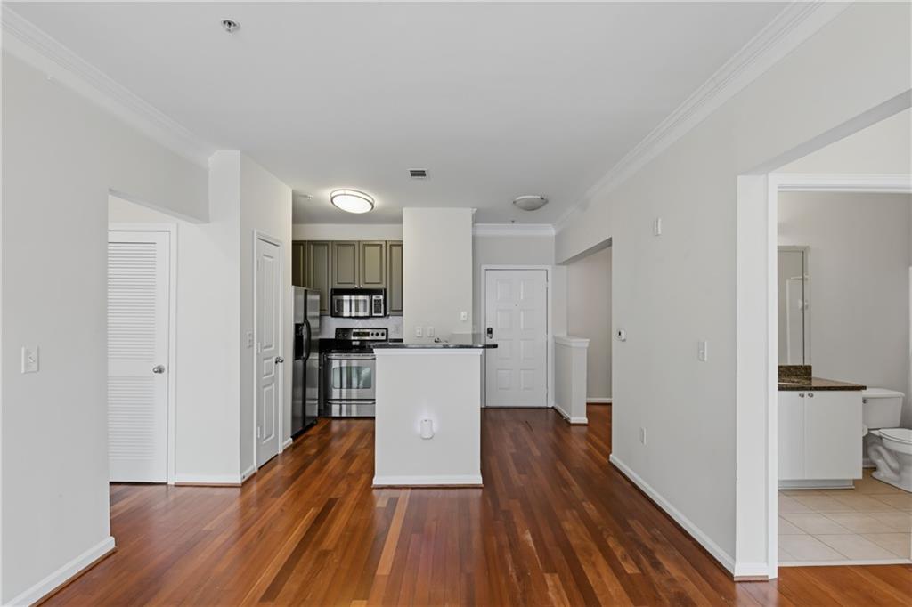 10 Perimeter Summit Boulevard, Unit 3311 Atlanta, GA 30319 - Photo 46 of 68 a view of a kitchen from the hallway