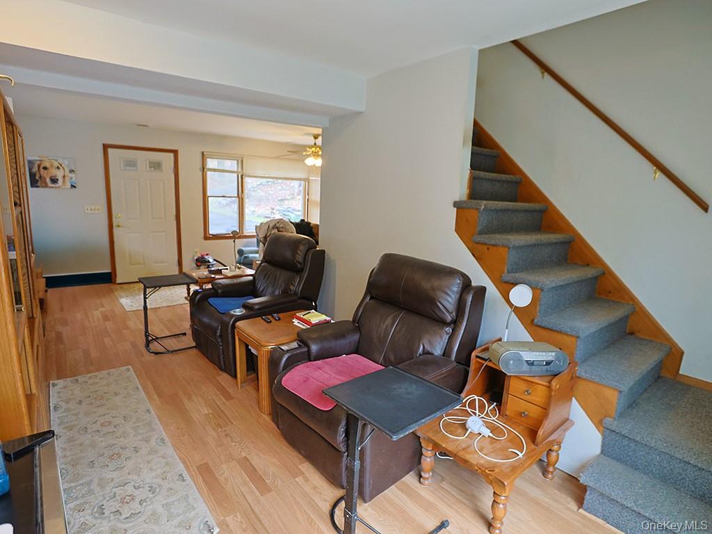 68 Kennel Road Cuddebackville, NY 12729 - Photo 9 of 21 a living room with furniture and wooden floor