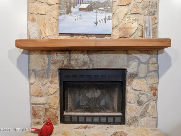 a kitchen with stainless steel appliances granite countertop a stove and a microwave
