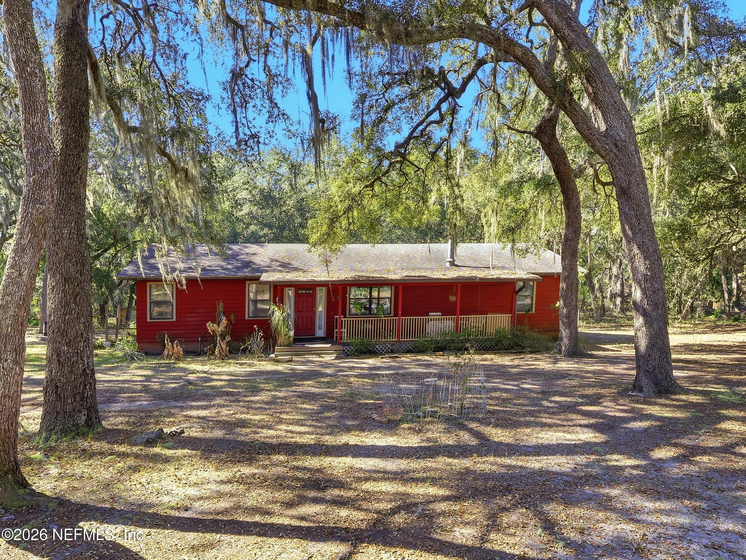 8336 Singleton Place Keystone Heights, FL 32656 - Photo 3 of 56 a view of a yard with a tree