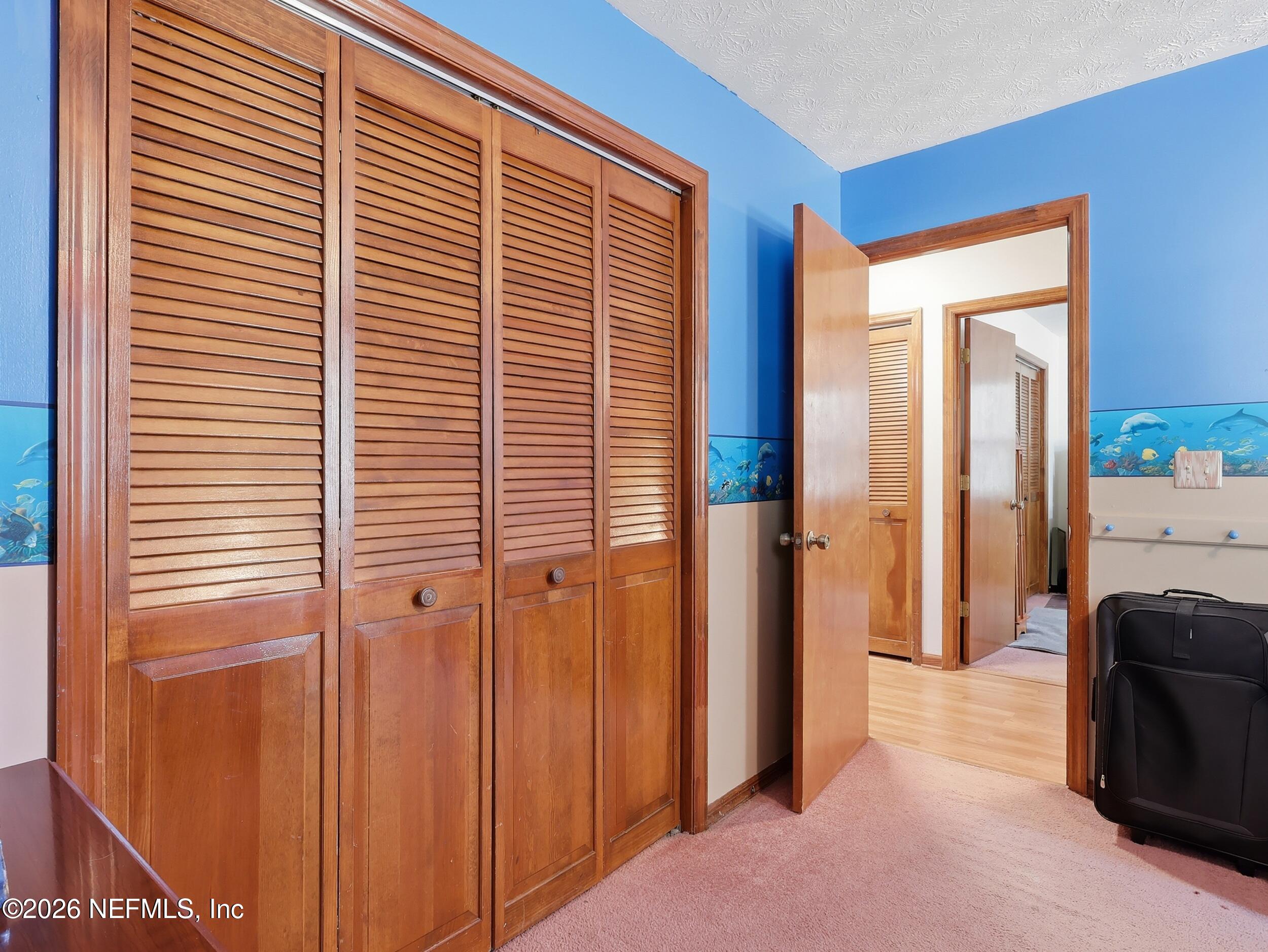 8336 Singleton Place Keystone Heights, FL 32656 - Photo 36 of 56 a view of a bedroom with a large window