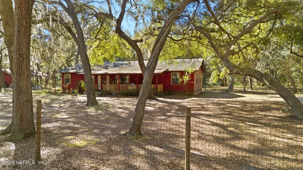a view of a porch with wooden floor