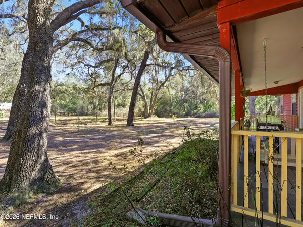 a backyard of a house with lots of green space