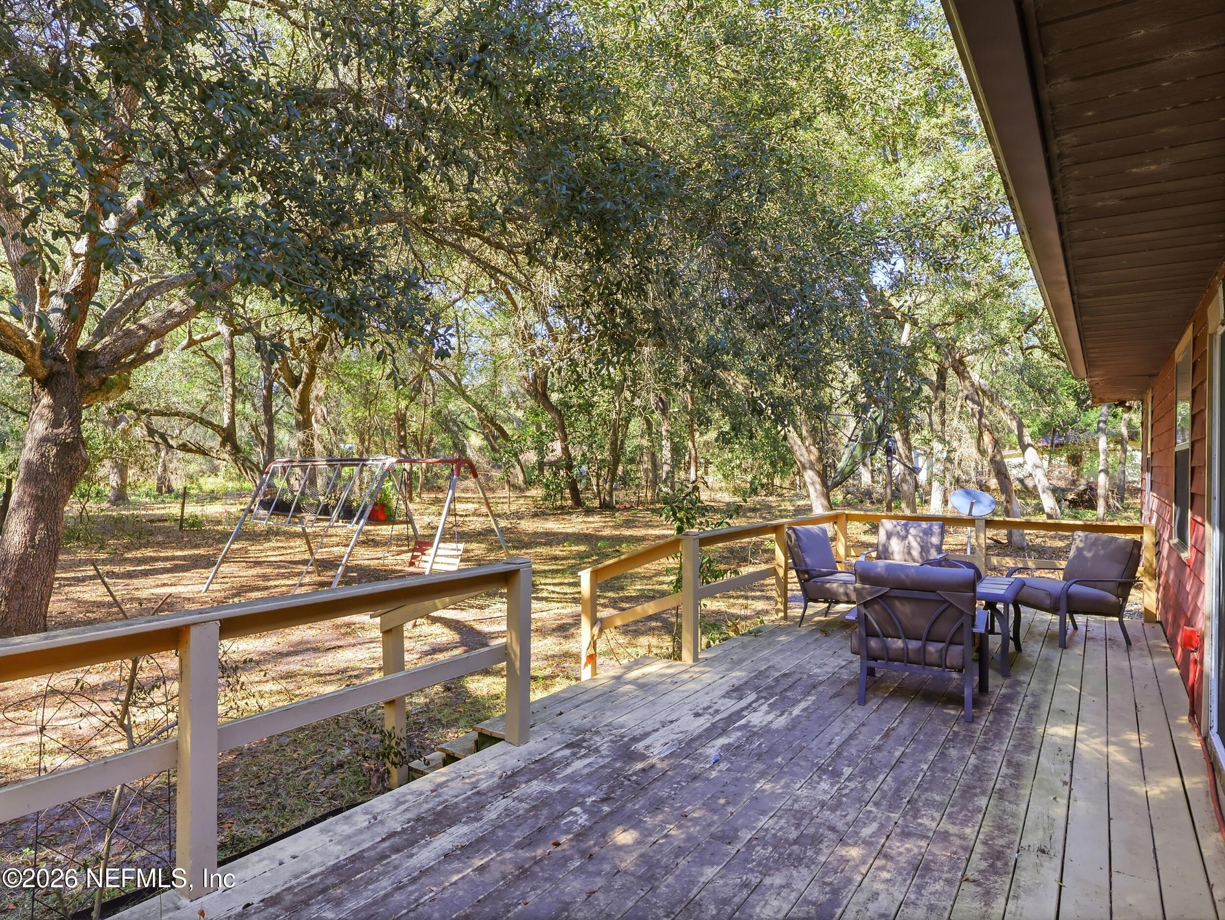 8336 Singleton Place Keystone Heights, FL 32656 - Photo 43 of 56 a view of a outdoor seating area