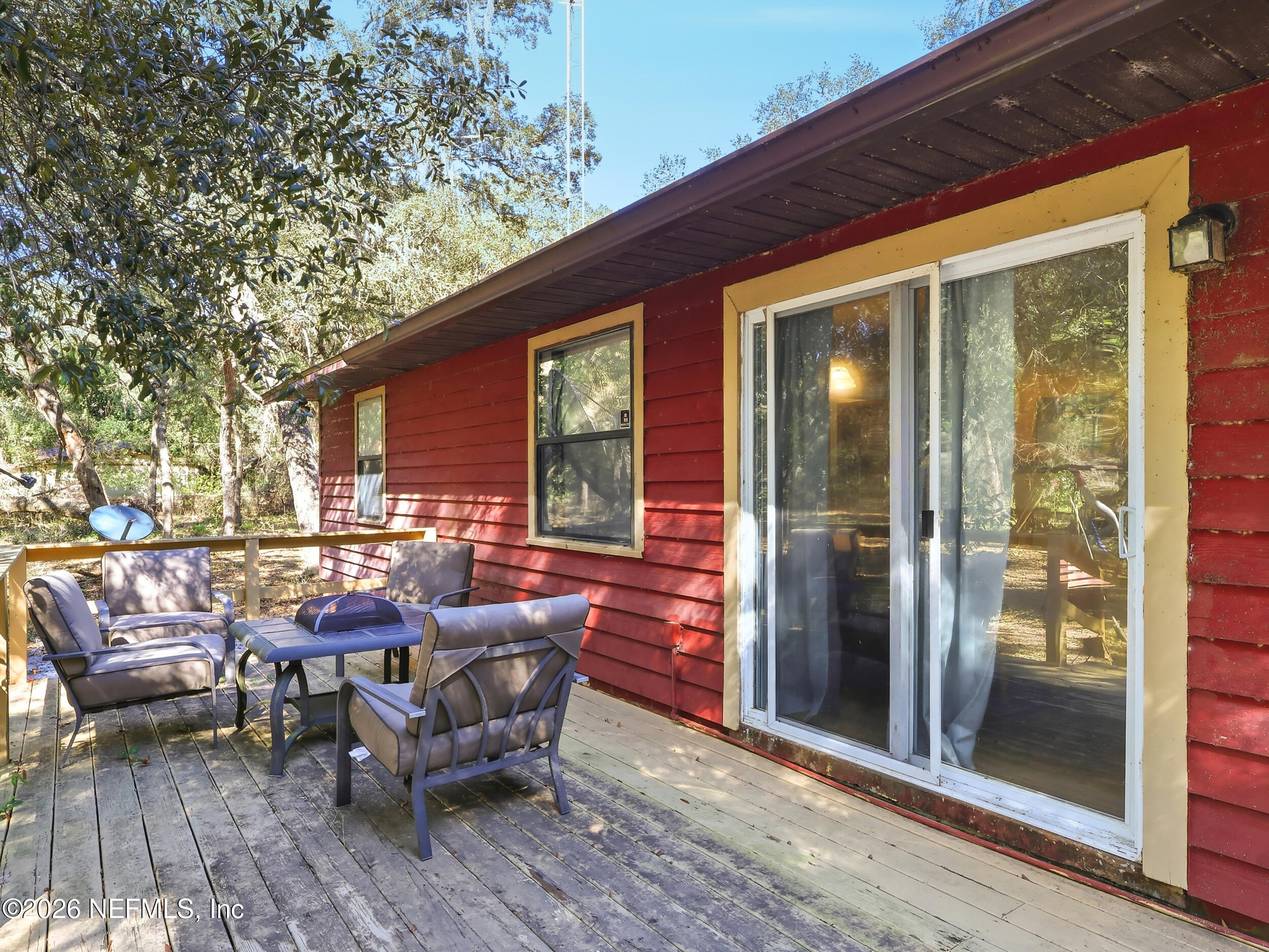 8336 Singleton Place Keystone Heights, FL 32656 - Photo 44 of 56 a balcony with furniture and outdoor space