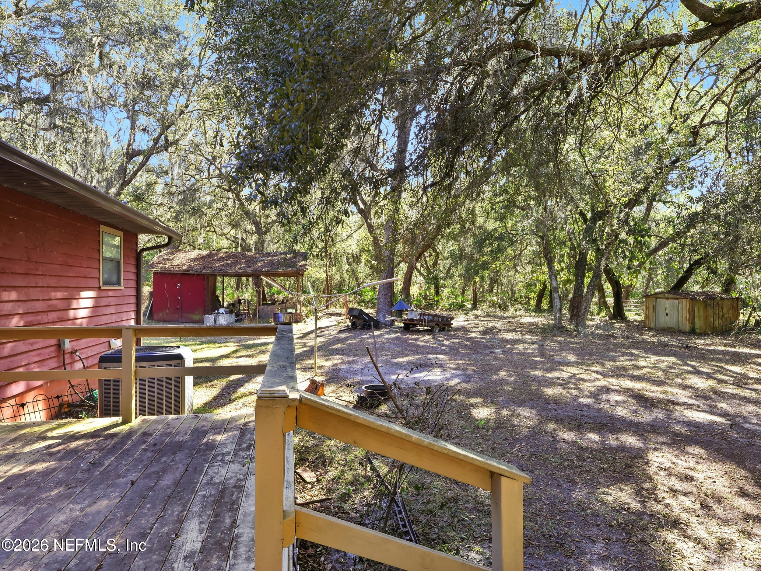 8336 Singleton Place Keystone Heights, FL 32656 - Photo 46 of 56 a view of a yard with wooden fence