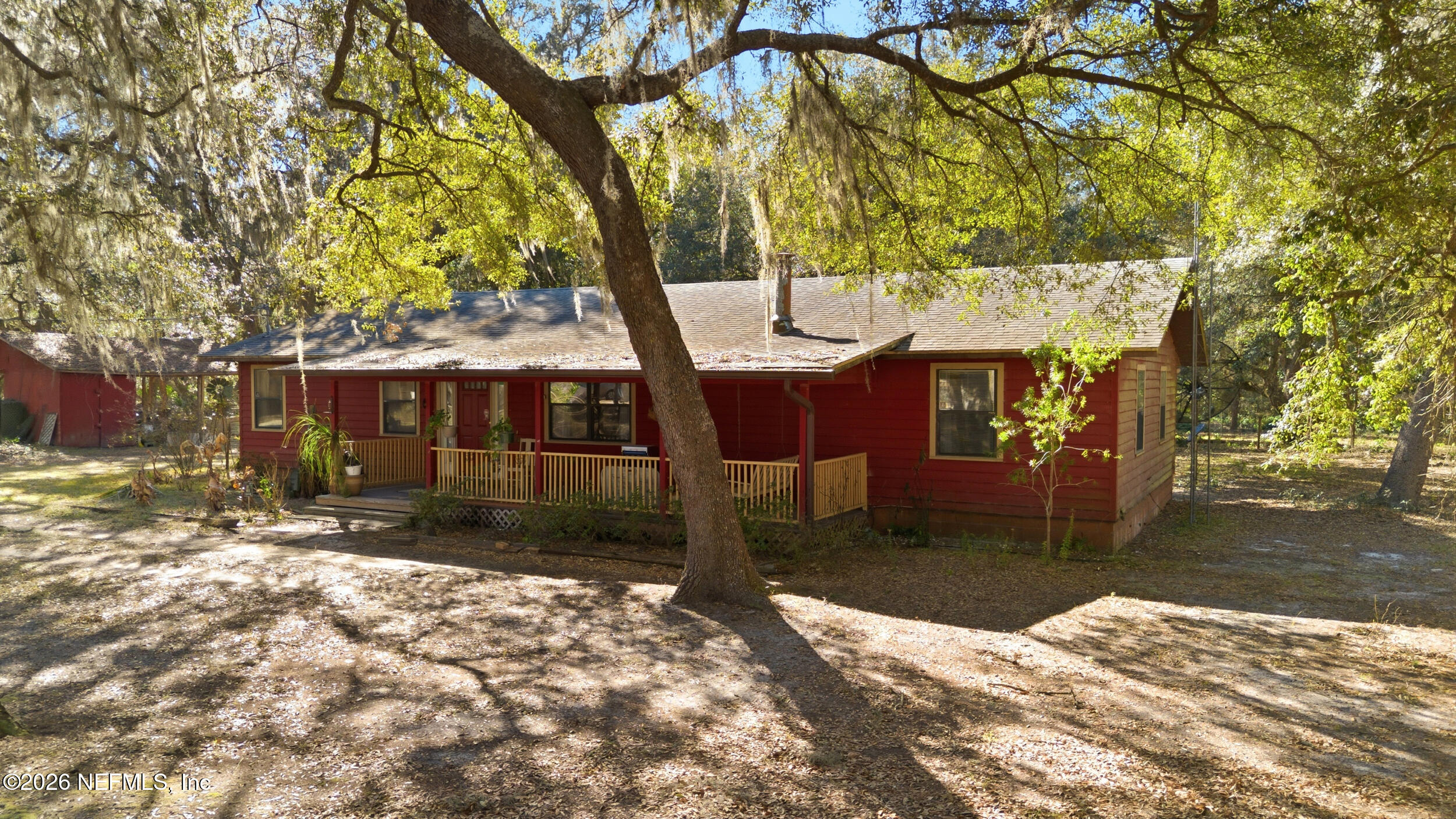 8336 Singleton Place Keystone Heights, FL 32656 - Photo 5 of 56 a front view of a house with a yard