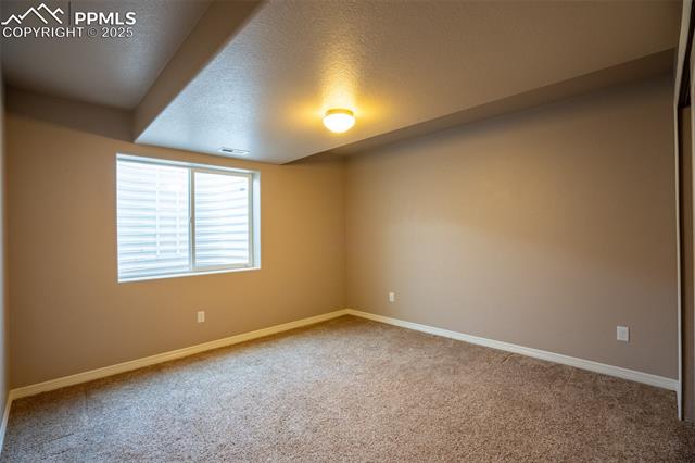 1985 Reed Grass Way Colorado Springs, CO 80915 - Photo 24 of 36 Bedroom 3 (basement)