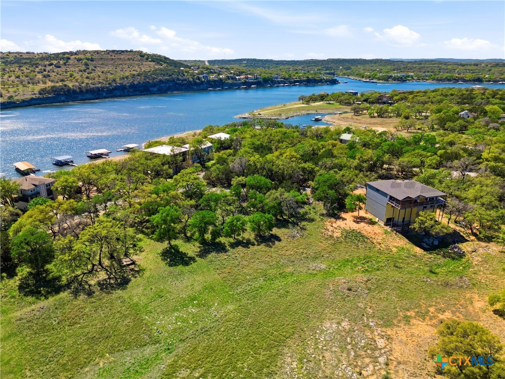 1309 Emerald Road Lago Vista, TX 78645 - Photo 14 of 26 an aerial view of residential houses with outdoor space and lake view