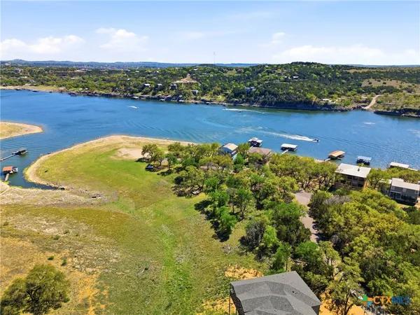 a view of a lake with a houses