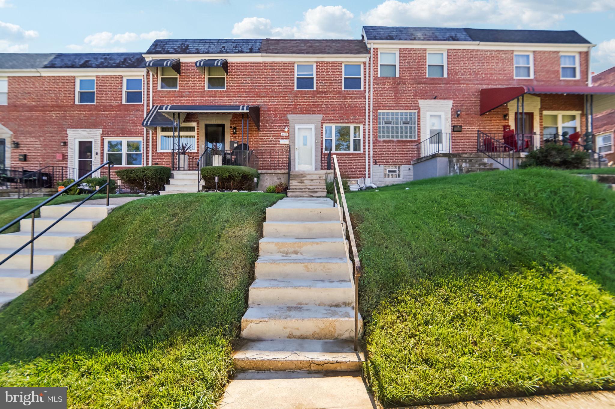 5413 Channing Road Baltimore, MD 21229 - Photo 2 of 45 a front view of a building with garden