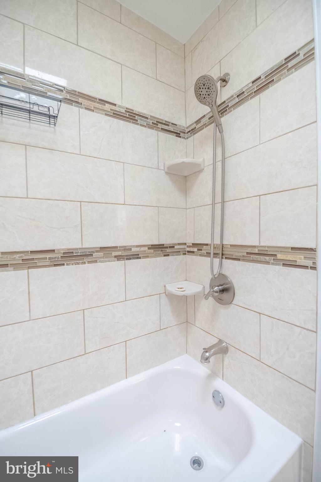 5413 Channing Road Baltimore, MD 21229 - Photo 30 of 45 a bathroom with a sink and a shower