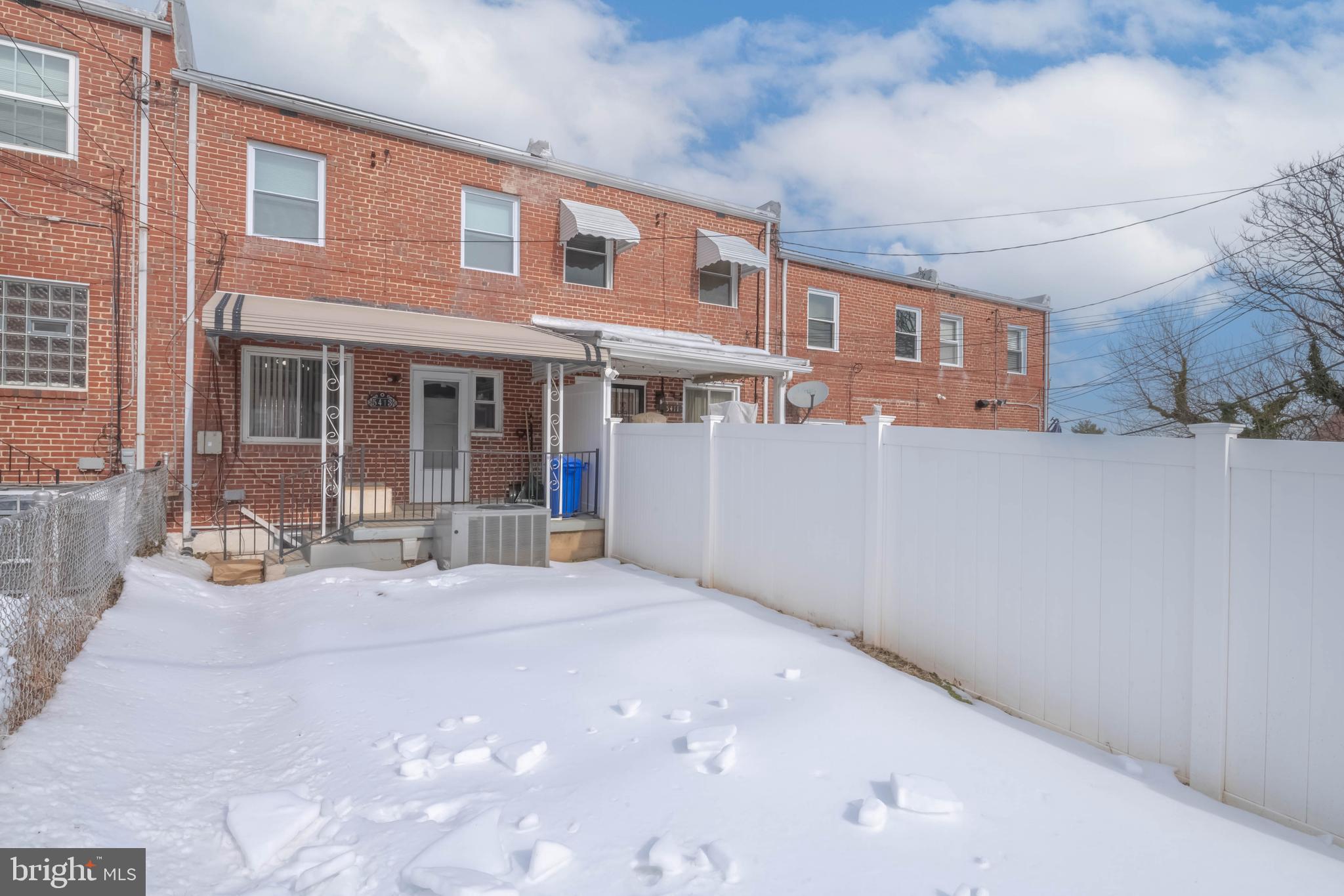 5413 Channing Road Baltimore, MD 21229 - Photo 41 of 45 a backyard of a house with seating space