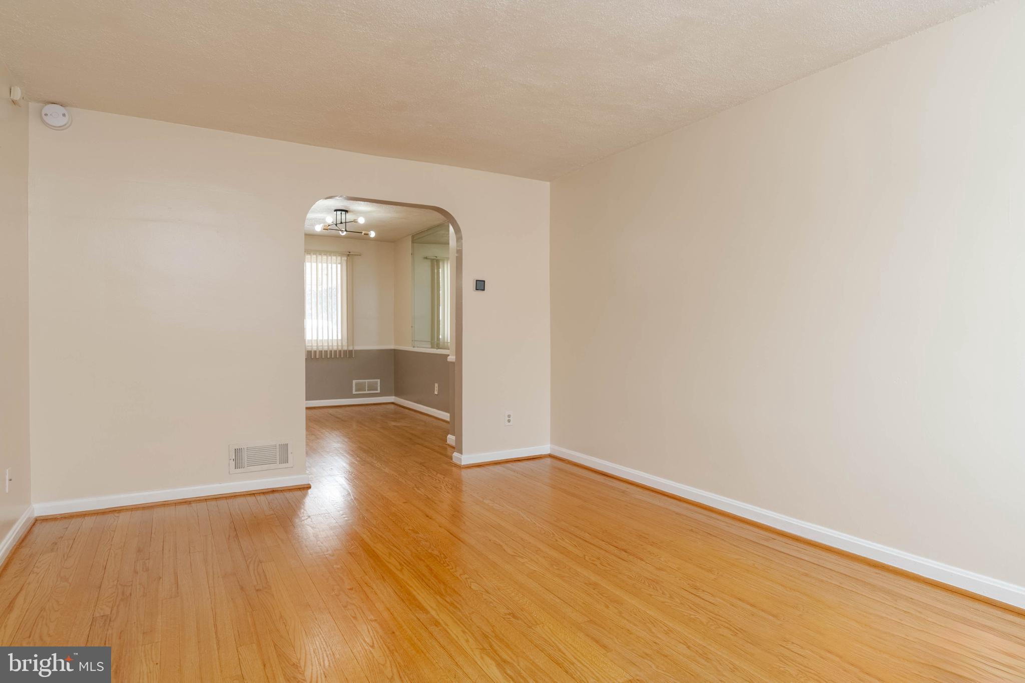 5413 Channing Road Baltimore, MD 21229 - Photo 8 of 45 a view of a room with wooden floor