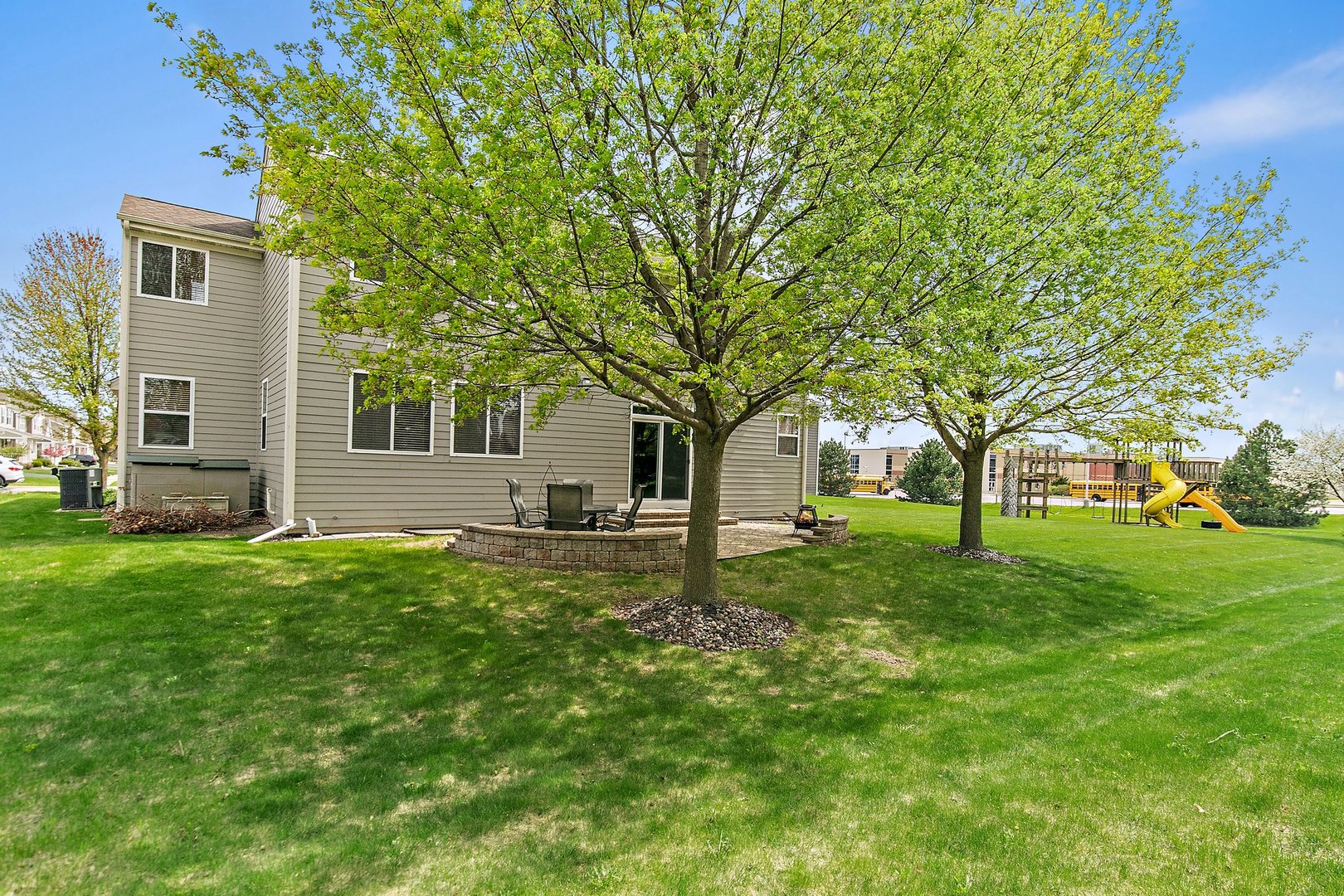 244 Prescott Avenue Elgin, IL 60124 - Photo 29 of 31 front view of a house with a yard