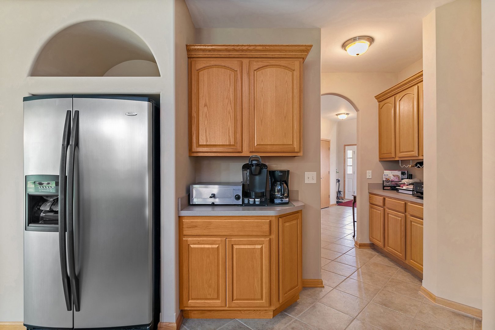 244 Prescott Avenue Elgin, IL 60124 - Photo 9 of 31 a kitchen with stainless steel appliances granite countertop a refrigerator a stove and a sink