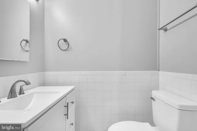 a utility room with closet dryer and washer