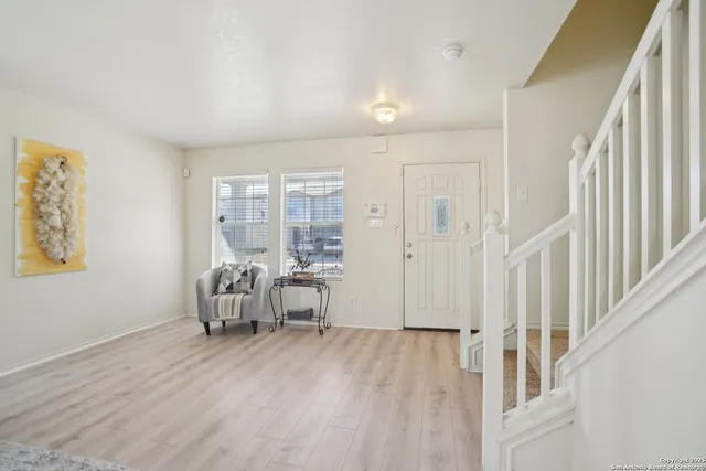 a view of livingroom with furniture and wooden floor