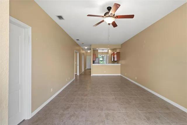 a view of a bathroom from a hallway