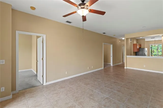 a bathroom with a sink mirror and shower