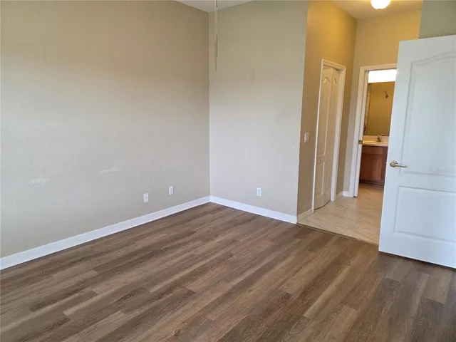 a view of storage and utility room with racks on the wall