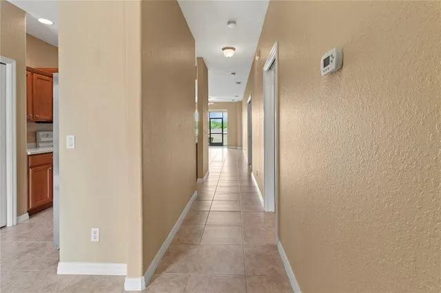 a kitchen with a sink stove and microwave