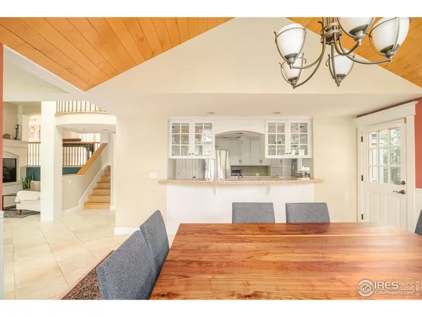 a view of a living room and kitchen