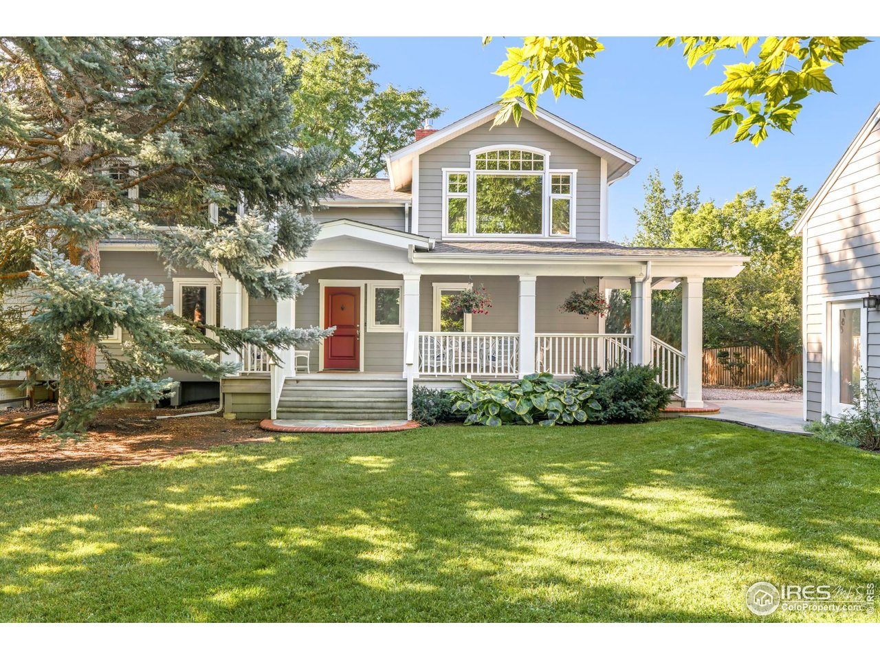 3788 26th Street Boulder, CO 80304 - Photo 2 of 47 a front view of a house with a garden
