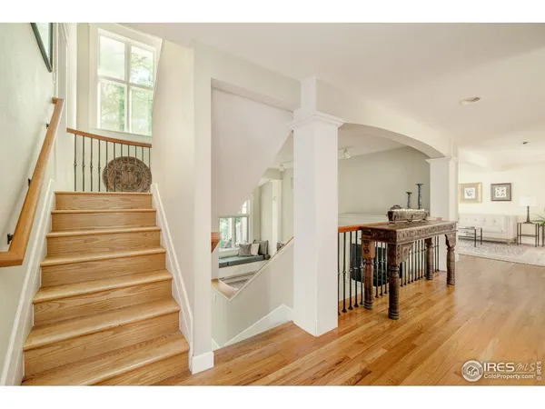 a view of a living room and entryway