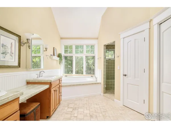 a open kitchen with granite countertop a sink and dishwasher with a large window