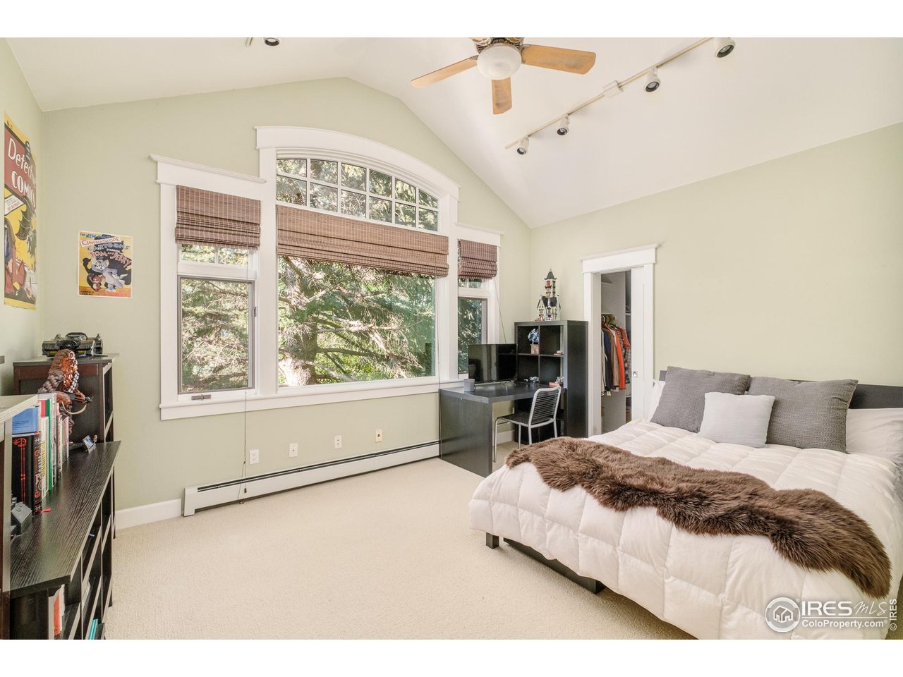 3788 26th Street Boulder, CO 80304 - Photo 29 of 47 a bedroom with a large bed and a large window