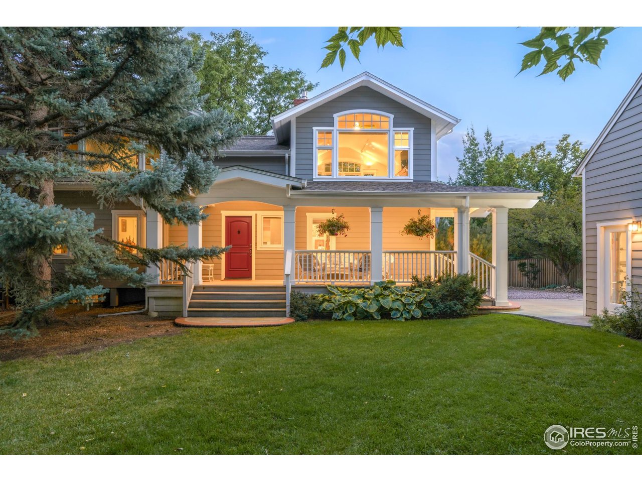 3788 26th Street Boulder, CO 80304 - Photo 3 of 47 a front view of a house with a yard