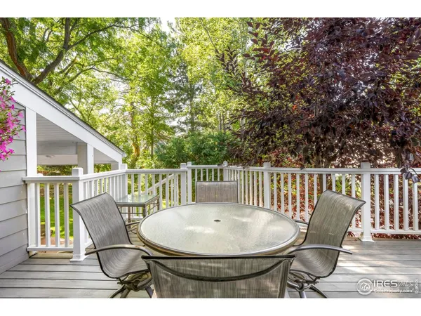 a view of balcony with furniture