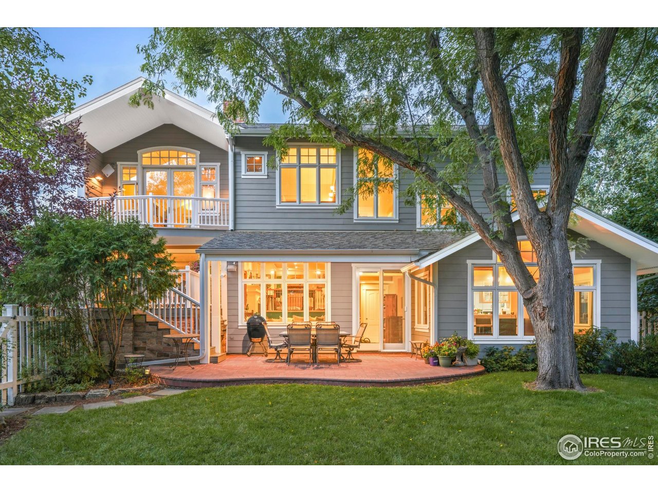 3788 26th Street Boulder, CO 80304 - Photo 6 of 47 a front view of a house with a yard