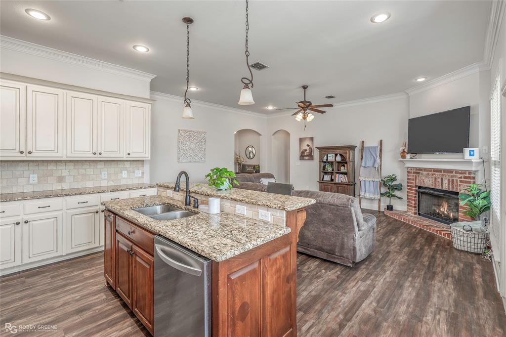 711 Reeds Reef Bossier City, LA 71112 - Photo 11 of 36 a kitchen with a center island appliances and cabinets