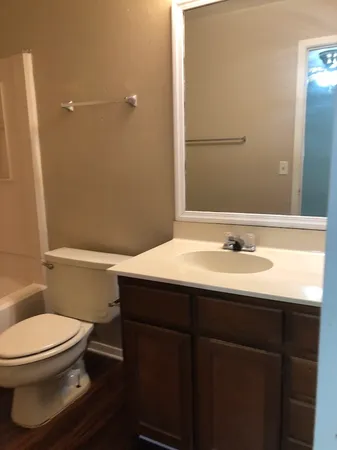 a bathroom with a sink and a toilet