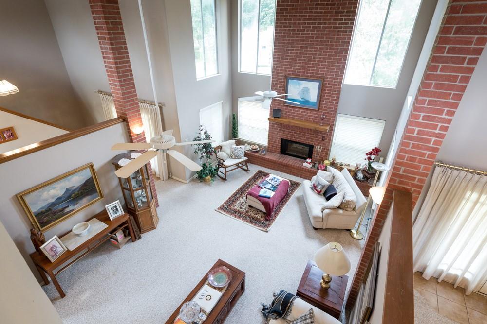 9554 David Fort Road Argyle, TX 76226 - Photo 22 of 35 a living room with furniture and a fireplace