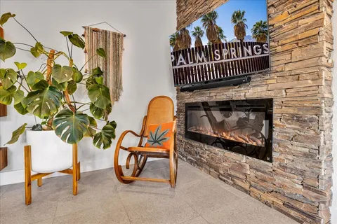 a view of living room kitchen outdoor dining space and furniture