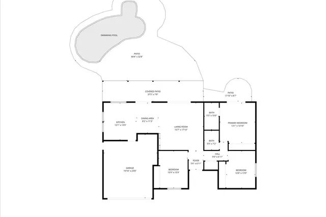 a kitchen with stainless steel appliances a refrigerator and a stove top oven