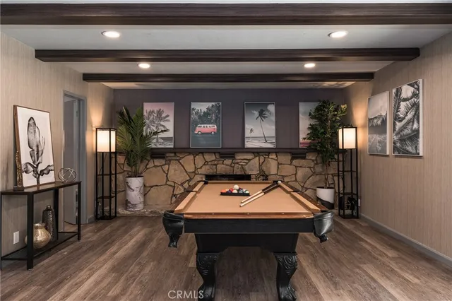 a room with furniture and wooden floor