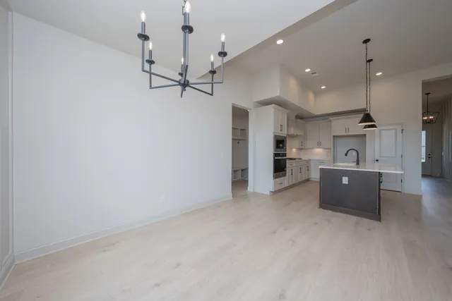 a utility room with washer and dryer