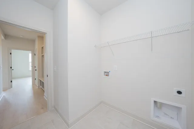 a view of livingroom with furniture and a fireplace