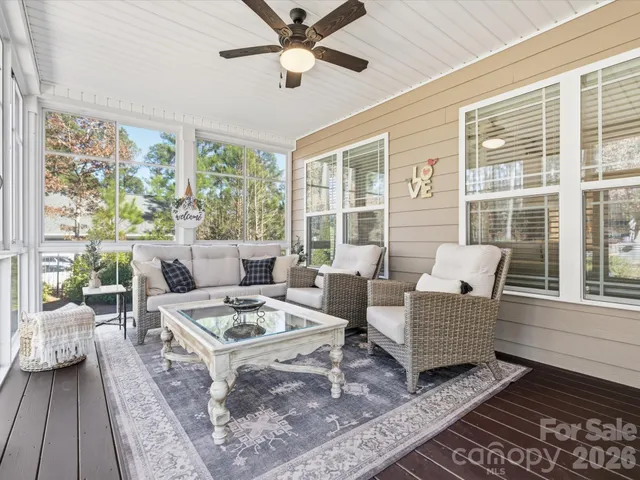 a view of backyard with outdoor seating