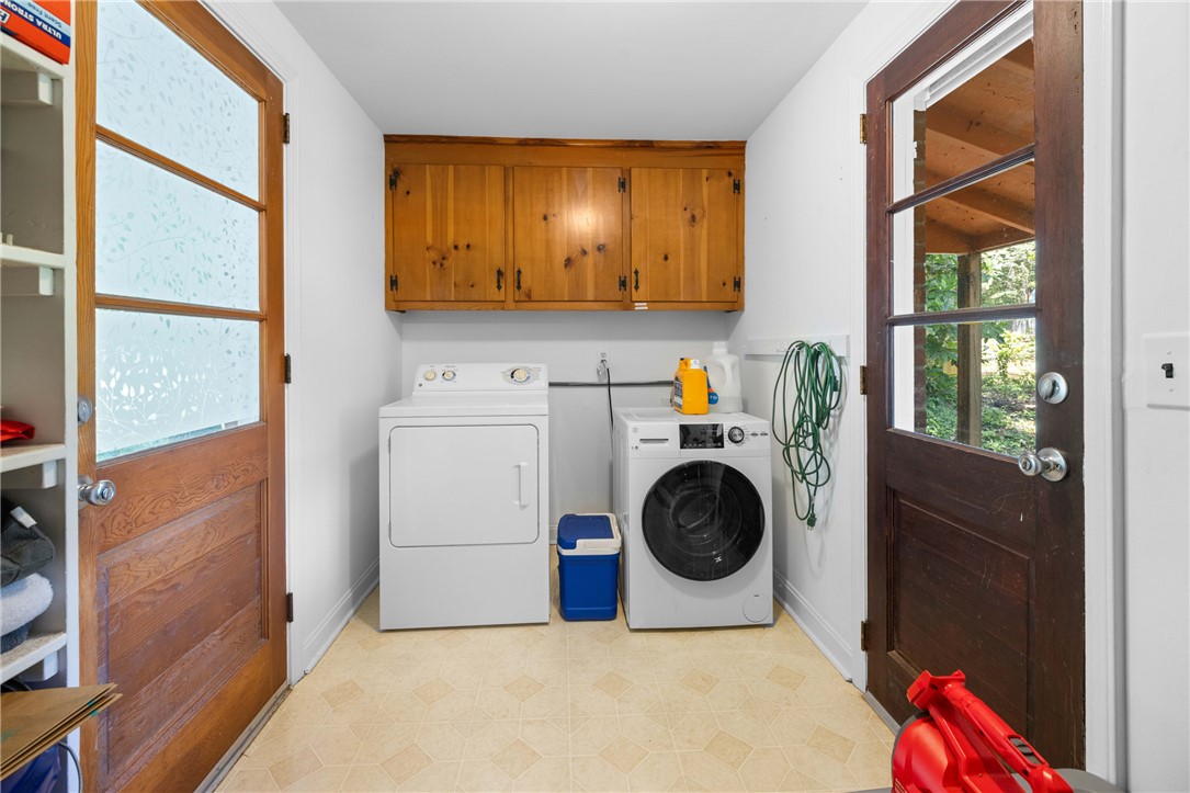 207 Brook Street Clemson, SC 29631 - Photo 16 of 39 Functional laundry space featuring modern appliances and convenient exterior access.
