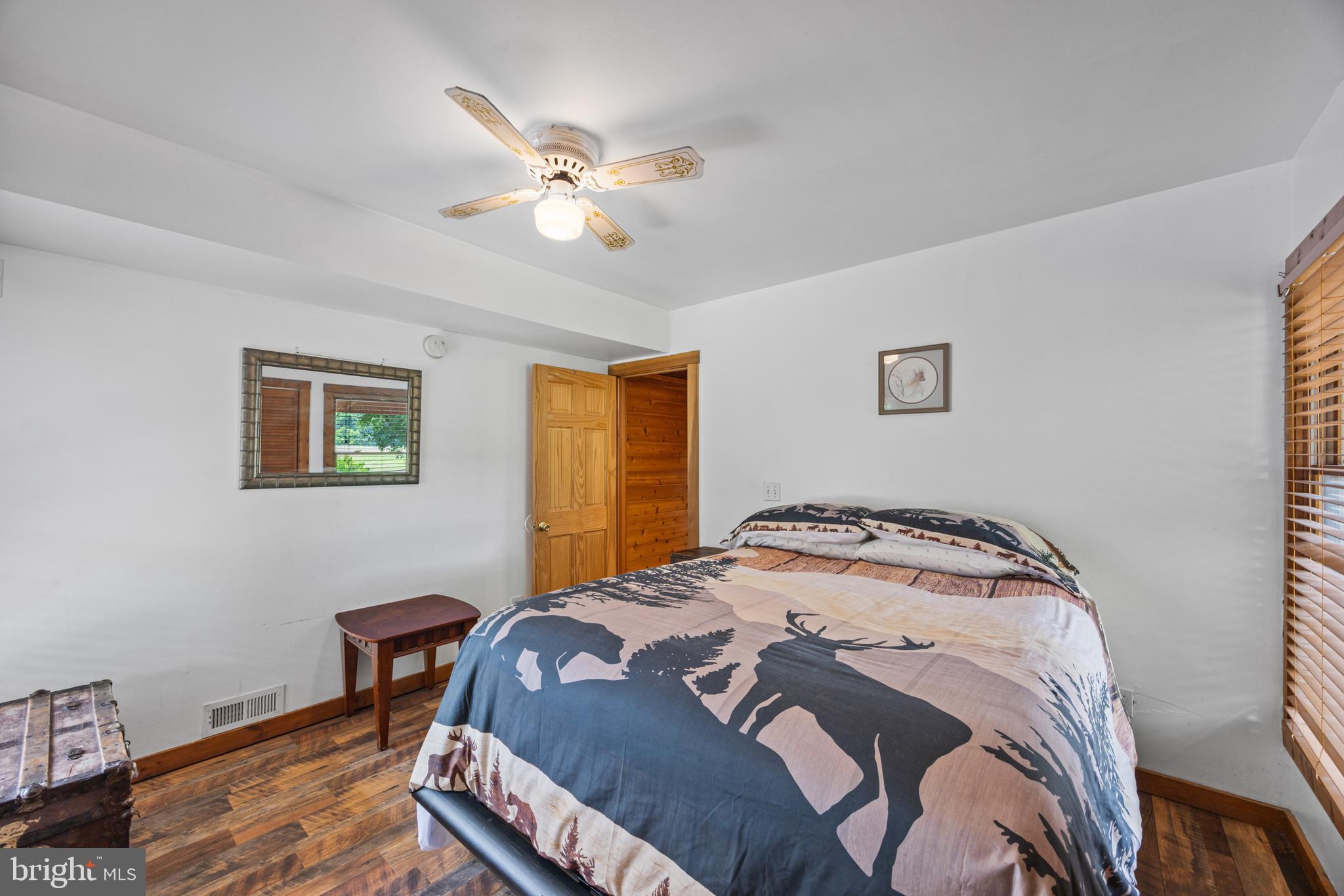1215 Fort Stover Road Luray, VA 22835 - Photo 109 of 143 a bedroom with a bed and a window