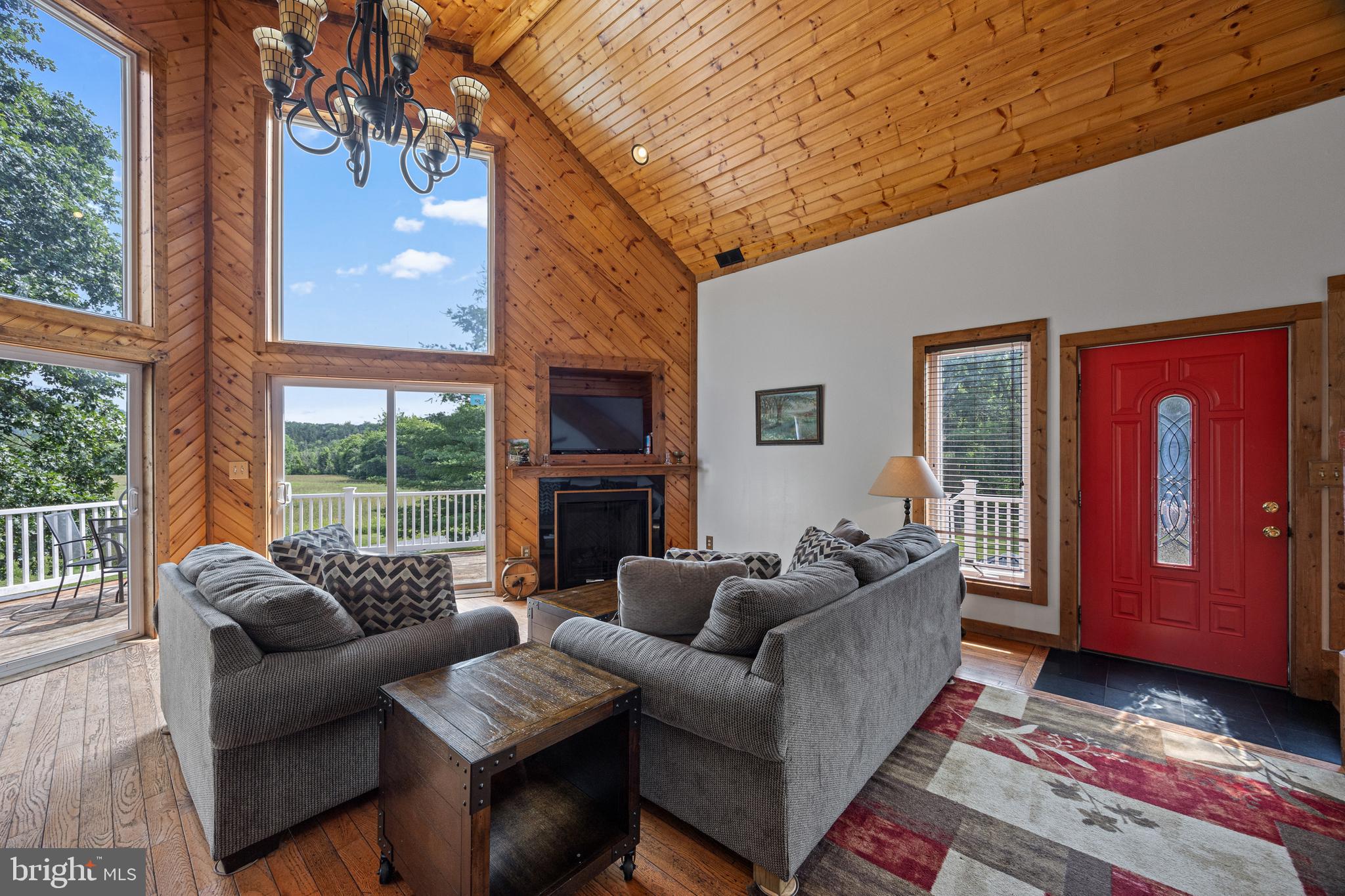 1215 Fort Stover Road Luray, VA 22835 - Photo 12 of 143 a living room with furniture and a fireplace
